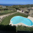 Piscina dallalto con vista mare